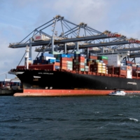 Containers are loaded onto a ship at the port of Rotterdam, the Netherlands. | REUTERS 
